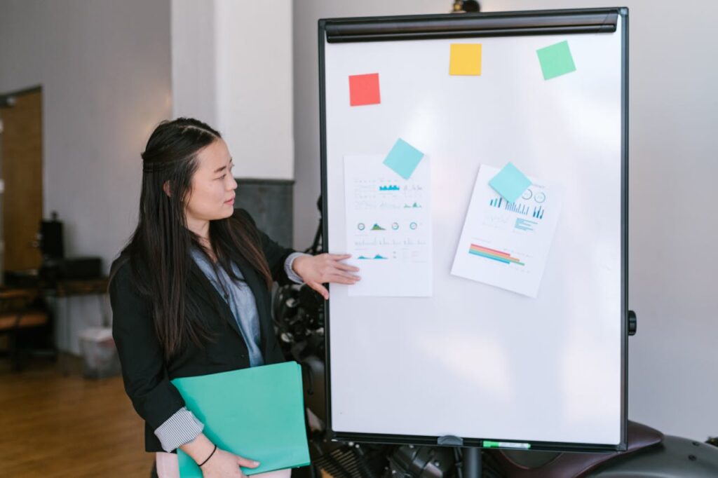 teaching in front of board