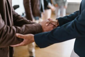 a close-up of people shaking hands